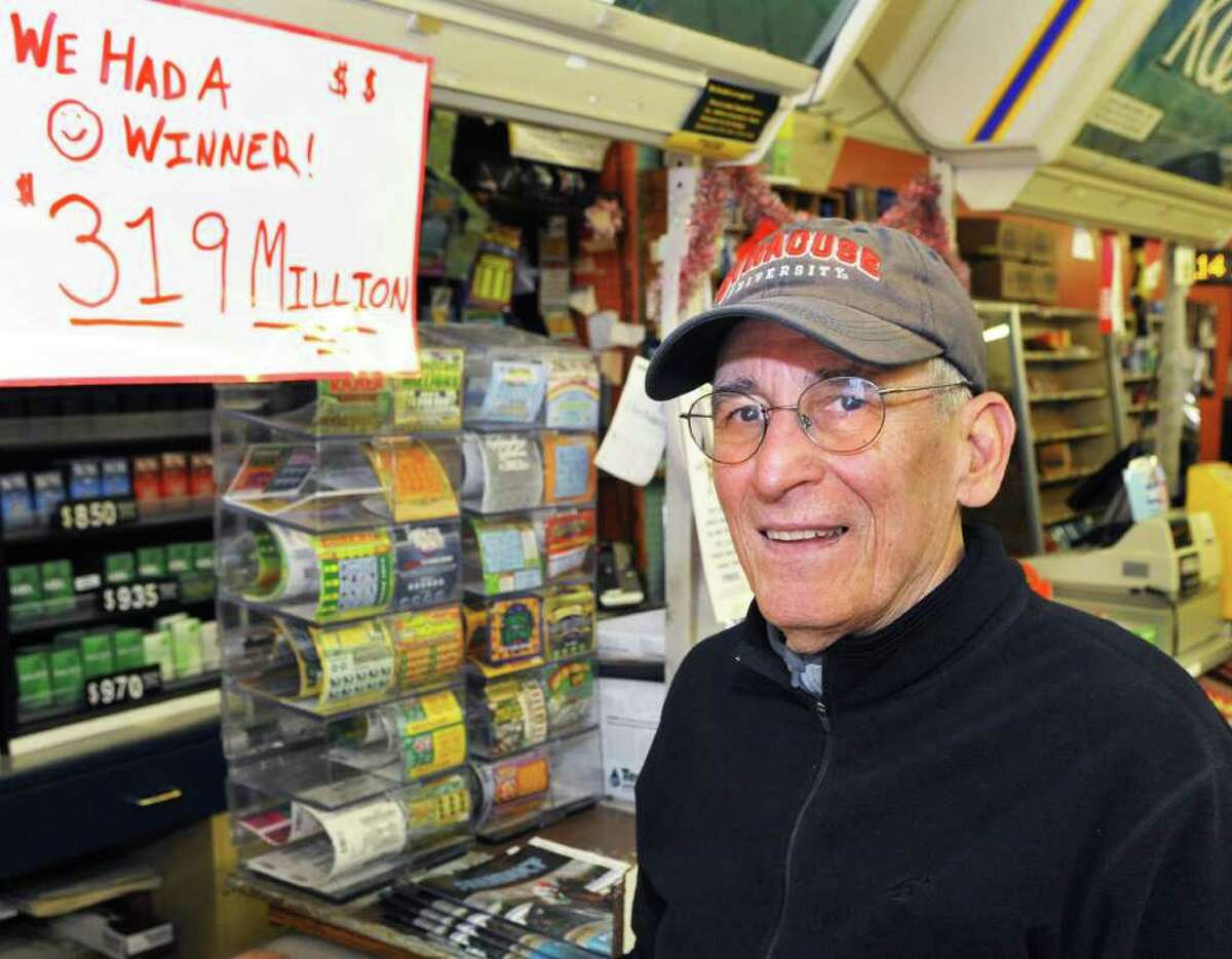 Steve Hutchins, owner of Coulson's News Center in downtown Albany at the counter Saturday March 26, 2011, where the winning ticket for Friday night's $319 million Mega Millions lottery jackpot was sold. (John Carl D'Annibale / Times Union)