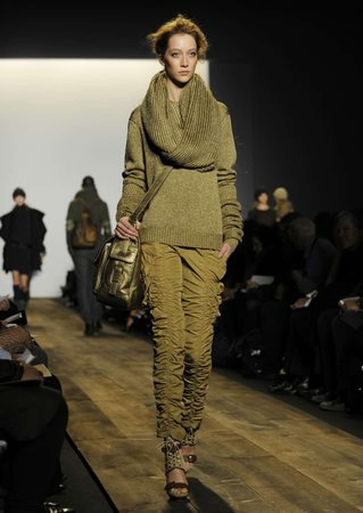 A model displays a creation by Michael Kors.