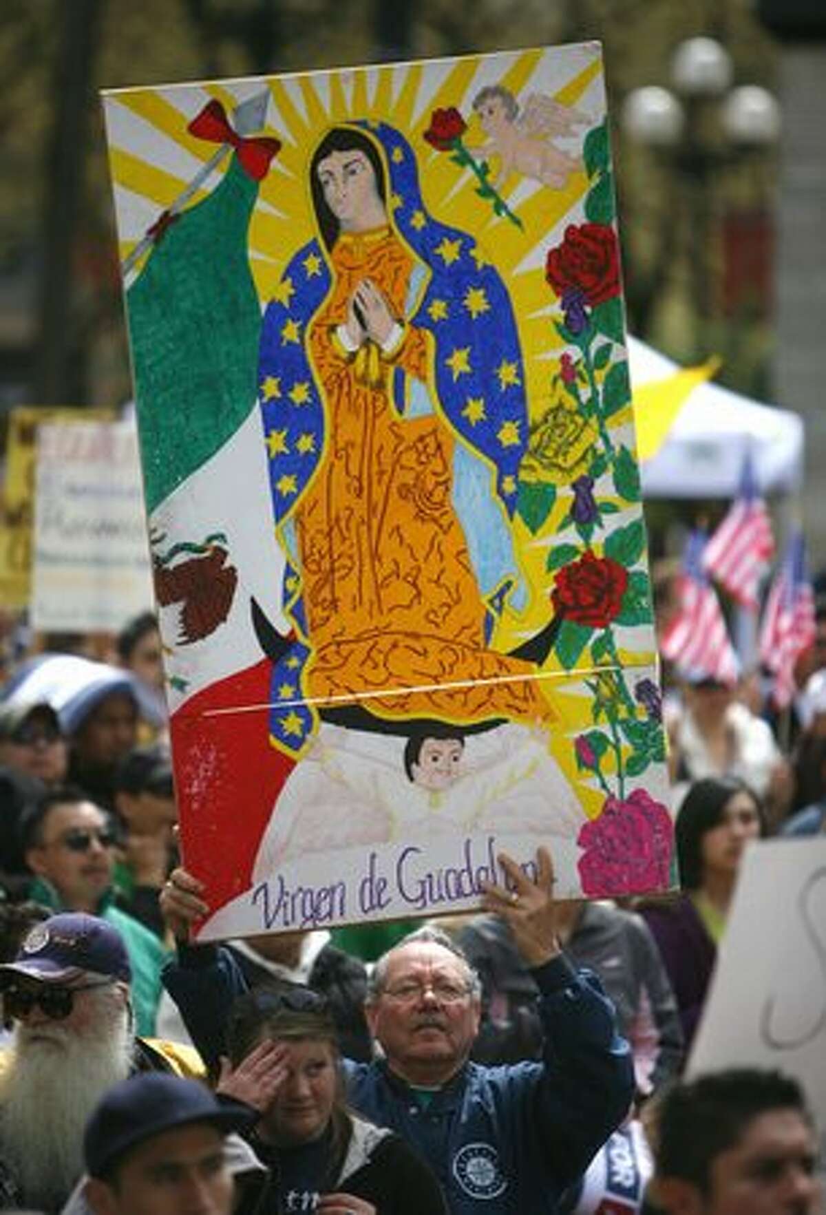 An estimated 7,000 people gather during an immigration reform rally in Seattle's Occidental Park on Saturday April 10, 2010. Speaker Pramila Jayapal, executive director of OneAmerica, said her organization is demanding that a bill be introduced in congress for immigration reform by May 1st.