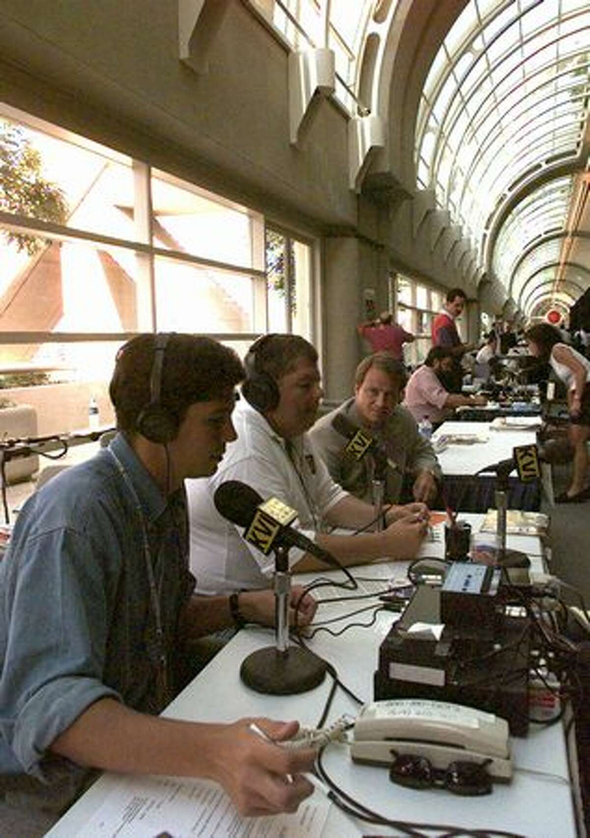 KVI radio's G. Schroeder, left, Kirby Wilbur, center, and Rob Strauss do their program from the second floor of the San Diego Convention Center, Aug. 13, 1996. (V. Arocho/seattlepi.com file)