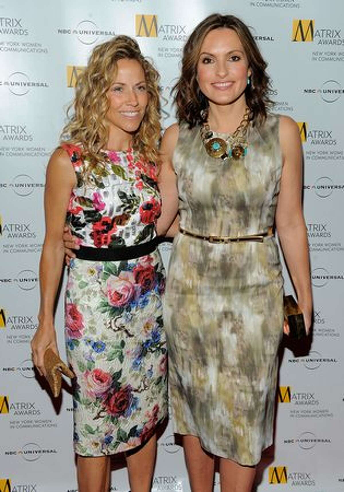 Singer Sheryl Crow and actress Mariska Hargitay pose for photos at the 2010 Matrix Awards presented by New York Women in Communications at The Waldorf Astoria in New York City.