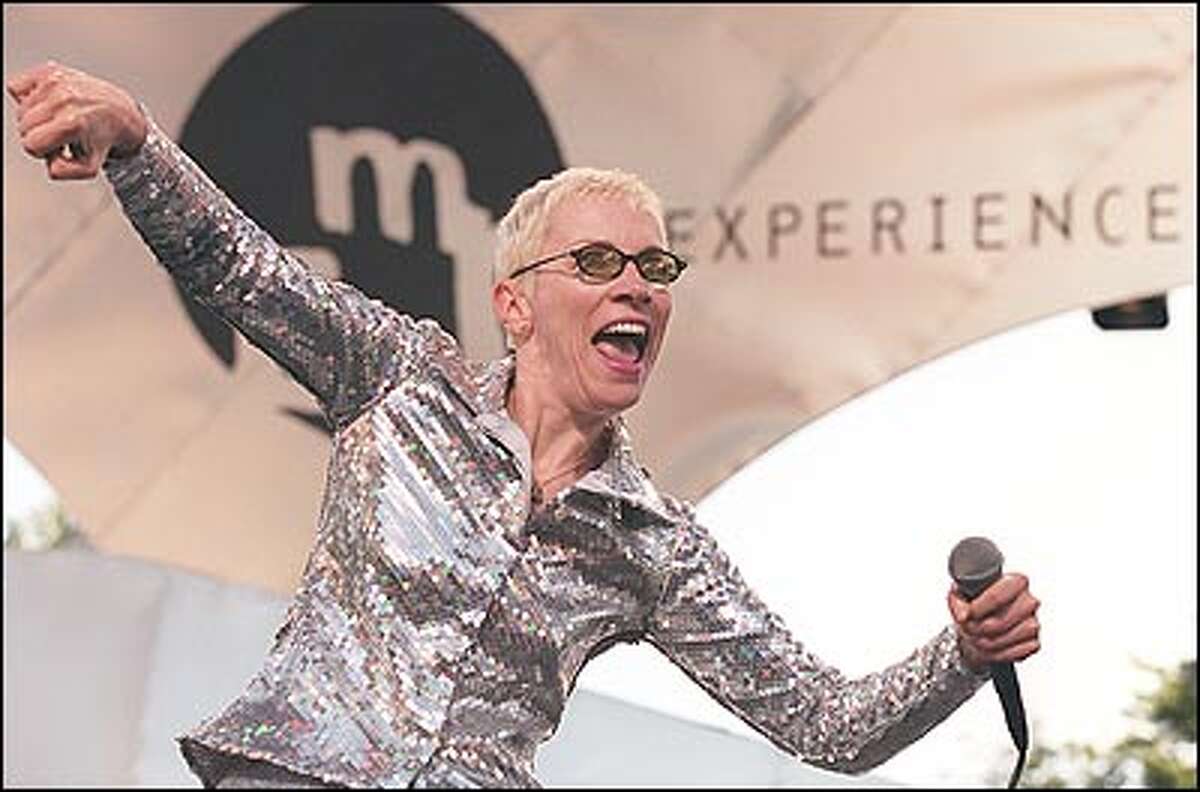 The Eurythmics' Annie Lennox performs at Memorial Stadium during Saturday night's EMP concert. The band walked offstage briefly because of a noisy helicopter.