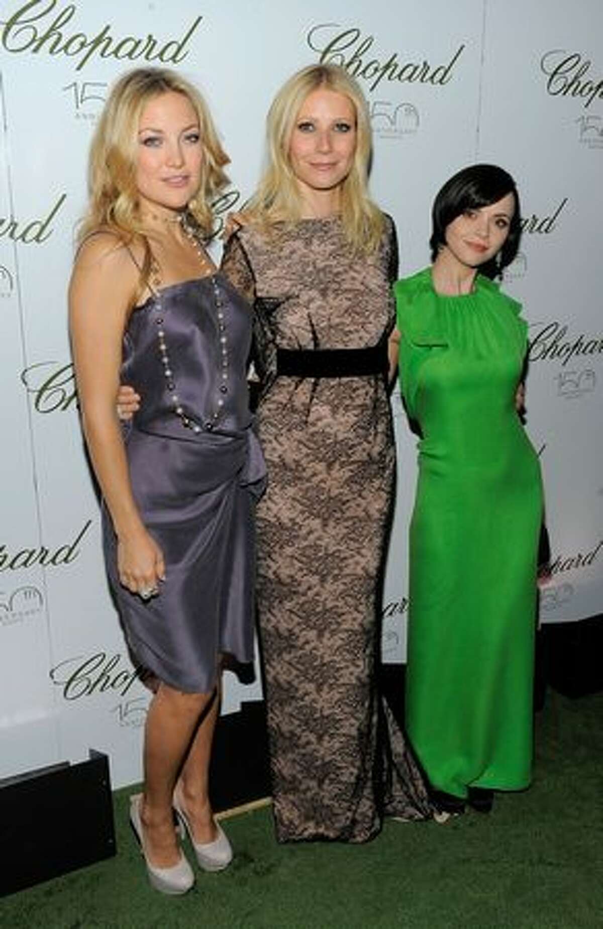 Actors Kate Hudson, Gwyneth Paltrow and Christina Ricci pose for a photo at the star studded gala celebrating Chopard's 150 years of excellence at The Frick Collection on April 29, 2010 in New York City.
