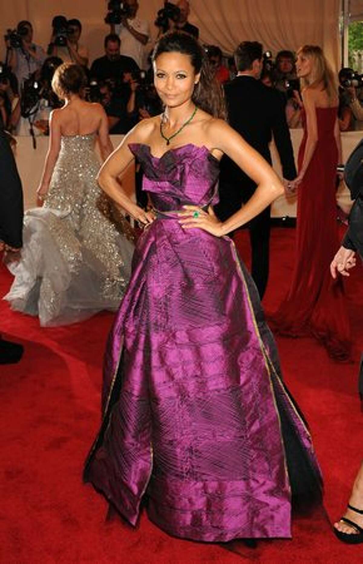 Actress Thandie Newton takes a dare in a Vivienne Westwood gown and pulls it off. This is not a color that works for many, but whoever chose it for her knew what they were doing.