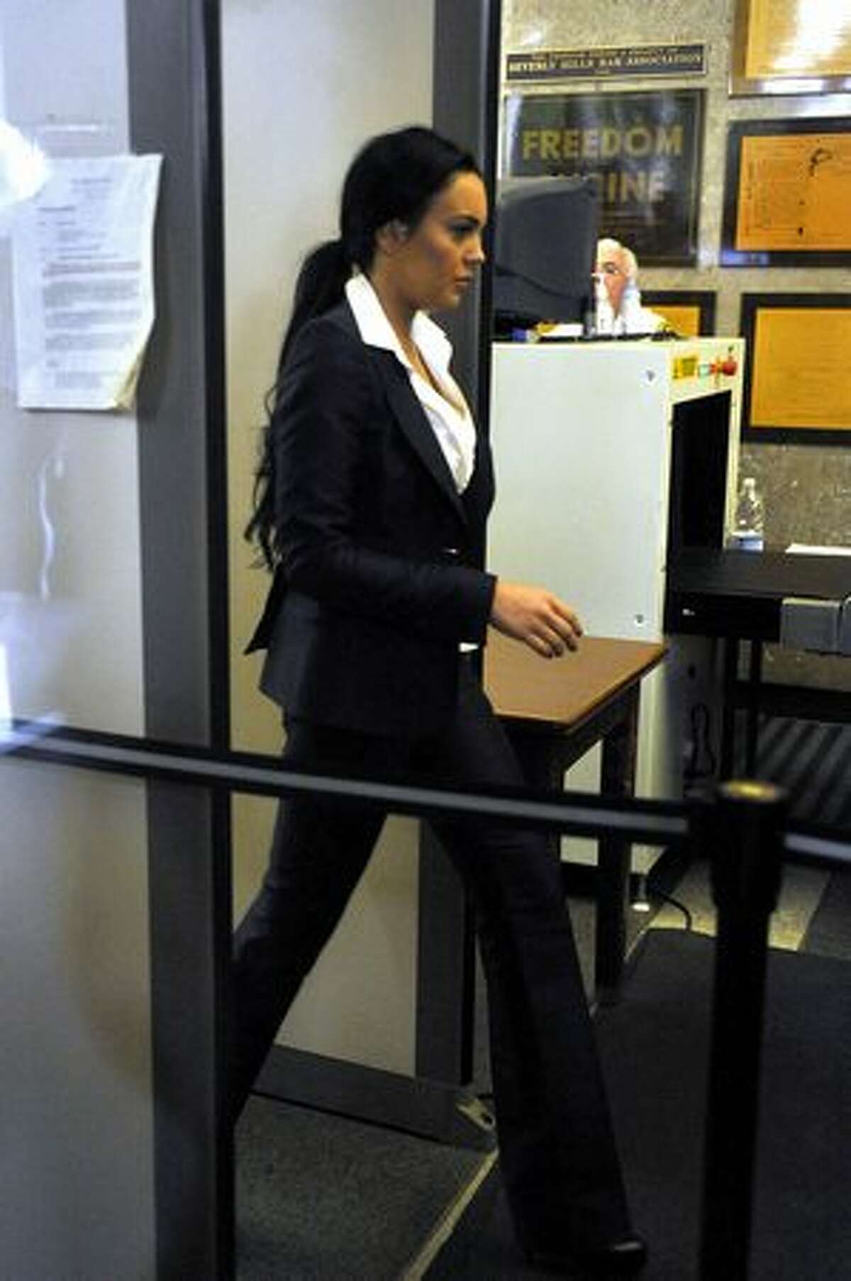 Lohan arrives at court for her probation status hearing on Monday.