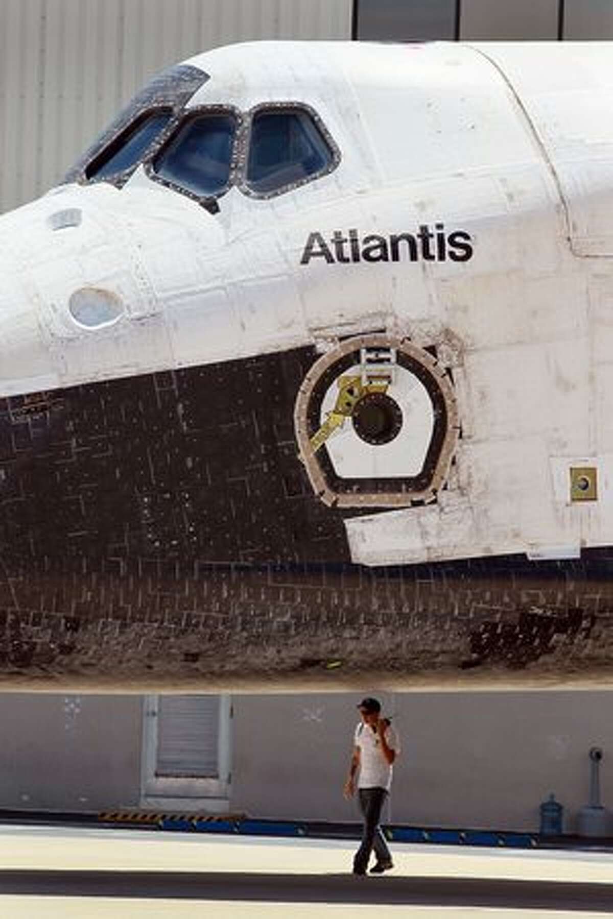 The Space Shuttle Atlantis is seen parked in front of the Orbiter Processing Facility after it returned to Kennedy Space Center in Cape Canaveral, Florida.