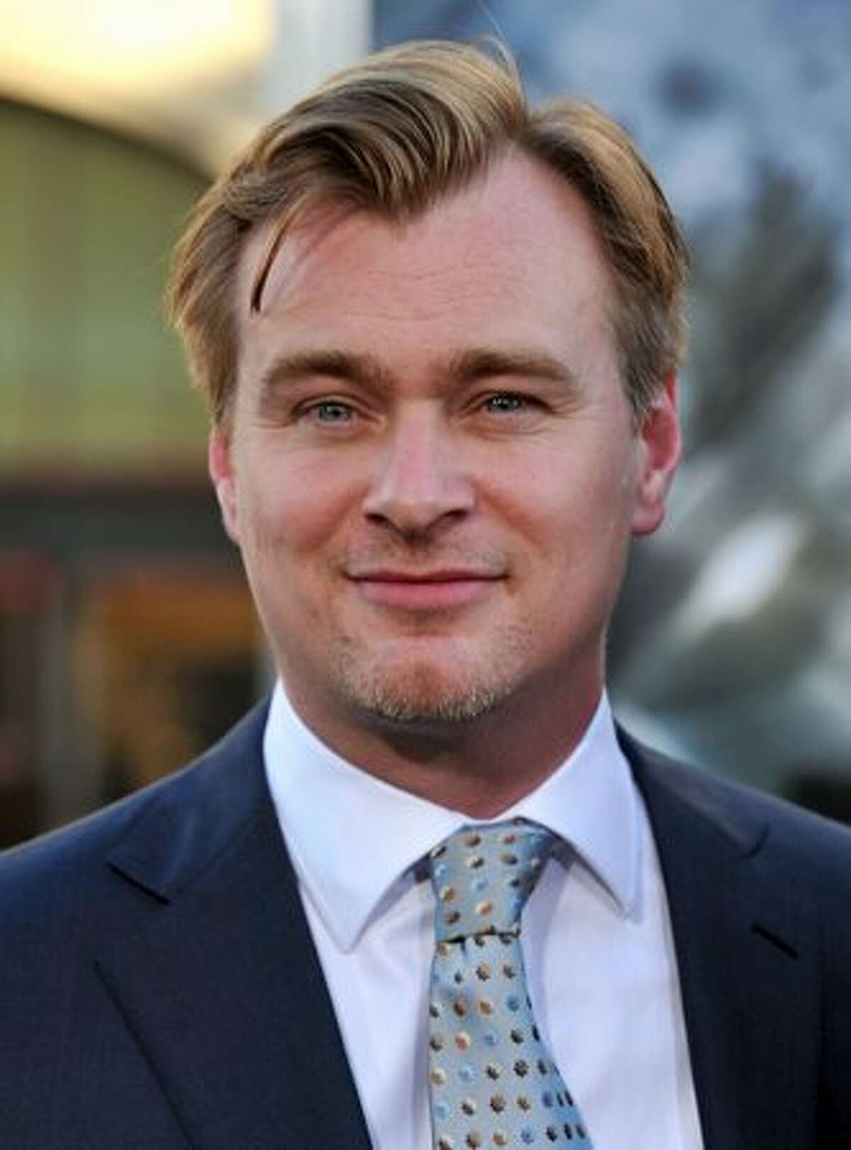 Writer/director Christopher Nolan arrives.