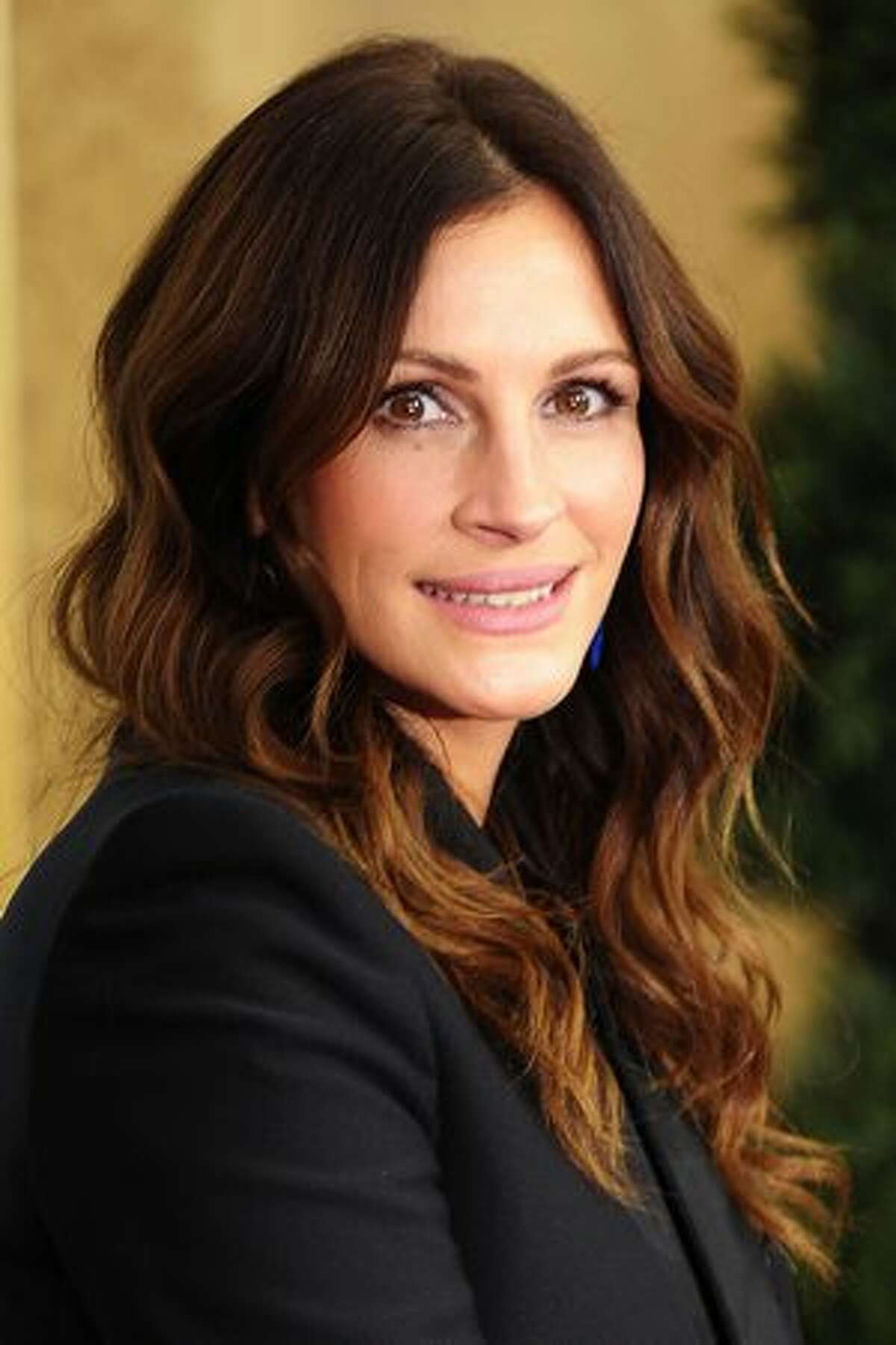 Actress Julia Roberts attends the premiere of "Eat Pray Love" at the Ziegfeld Theatre in New York City.