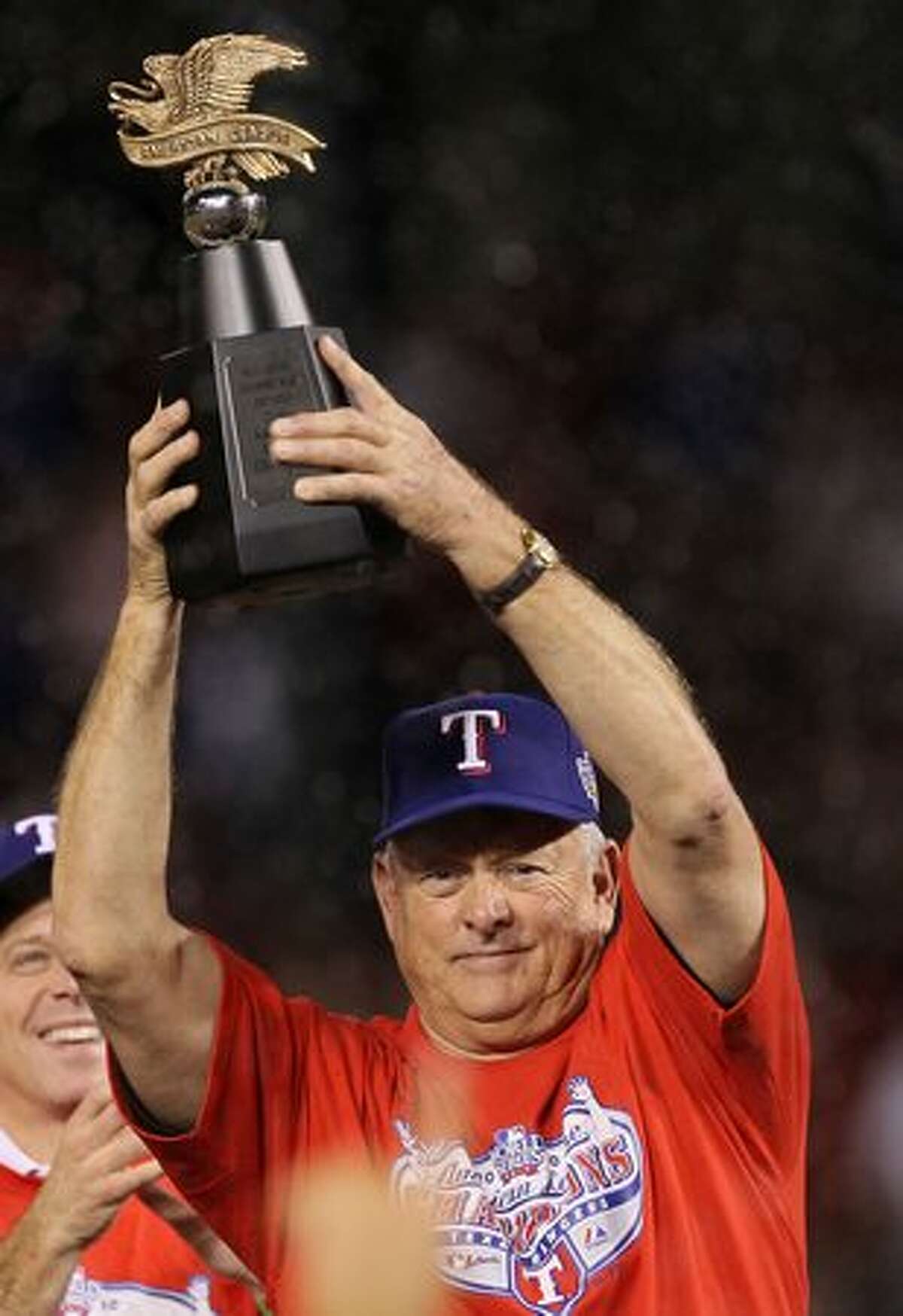 Team president Nolan Ryan of the Texas Rangers holds the Warren C. Giles Trophy after defeating the New York Yankees in Game Six of the ALCS to advance to the World Series during the 2010 MLB Playoffs at Rangers Ballpark in Arlington on Friday in Arlington, Texas.