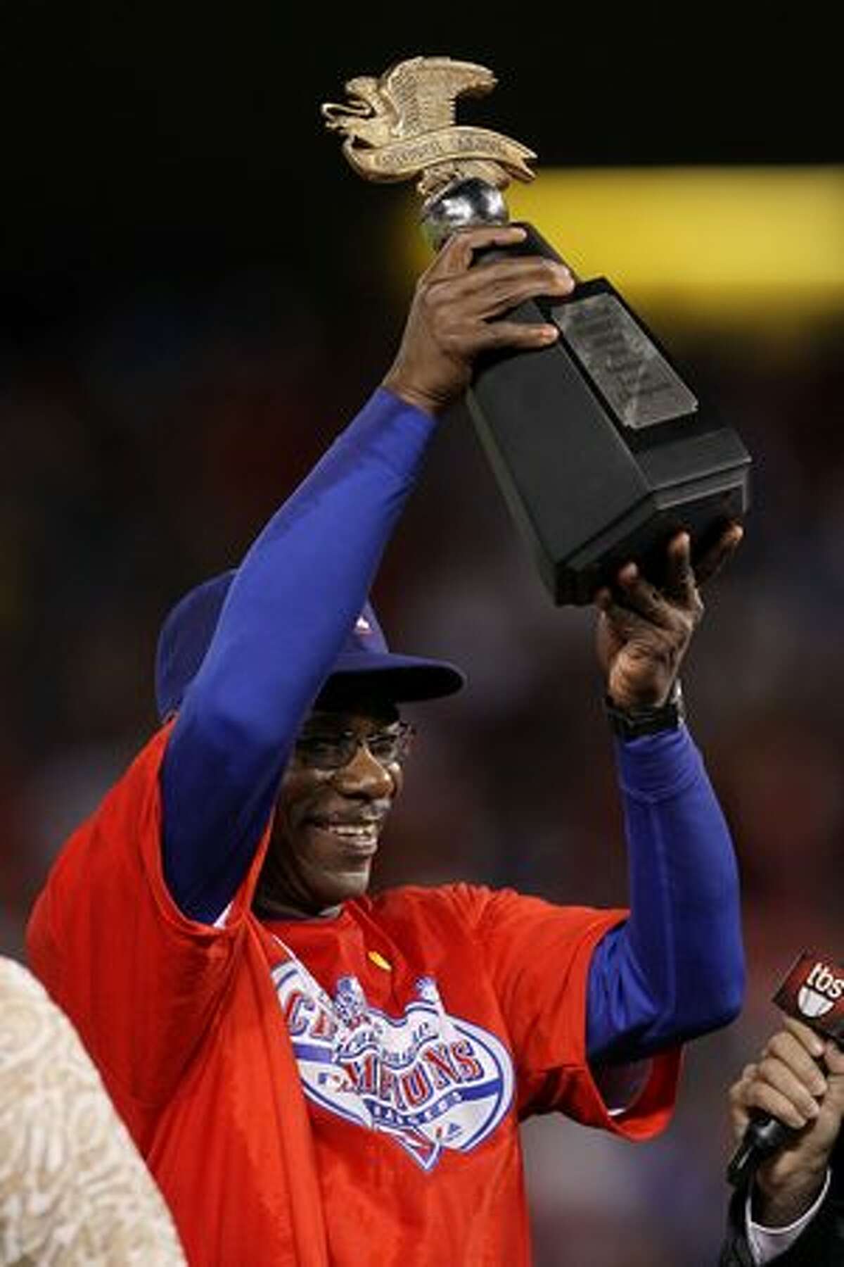 Manager Ron Washington of the Texas Rangers holds the Warren C. Giles Trophy after defeating the New York Yankees 6-1 in Game Six of the ALCS to advance to the World Series during the 2010 MLB Playoffs at Rangers Ballpark in Arlington on Friday in Arlington, Texas.