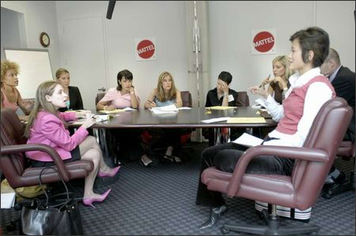 The women of Apex Corp. discuss their plans.