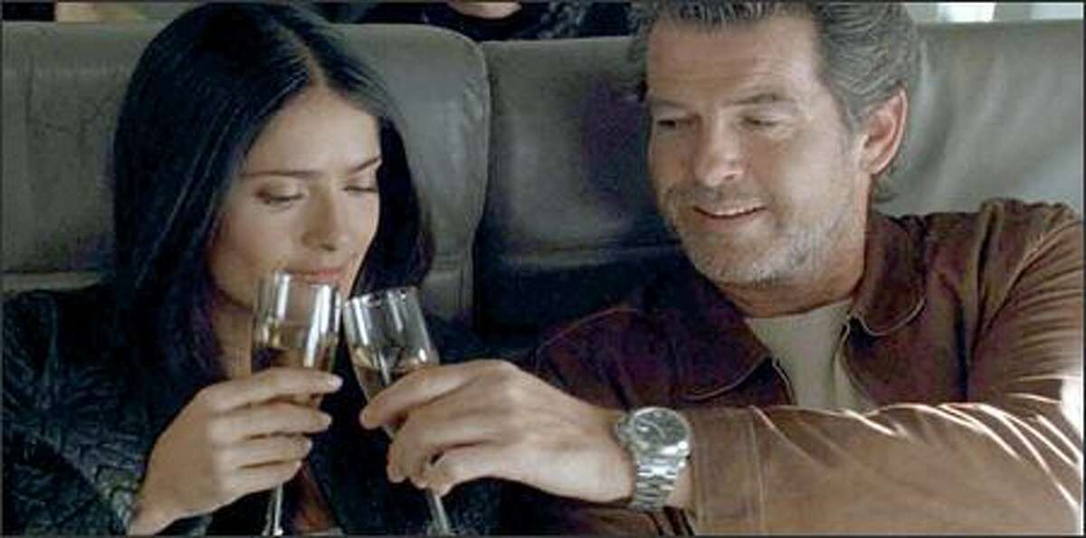 Pierce Brosnan plays "Max," a master thief, and Salma Hayek plays "Lola," his girlfriend and accomplice. The film begins with Max and Lola escaping to a tropical paradise to enjoy the spoils of their labor. But when an FBI agent (Woody Harrelson), who has pursued them for seven years, becomes convinced that they are actually plotting to pull off a million-dollar theft from a nearby "diamond cruise," a game of cat and mouse ensues.