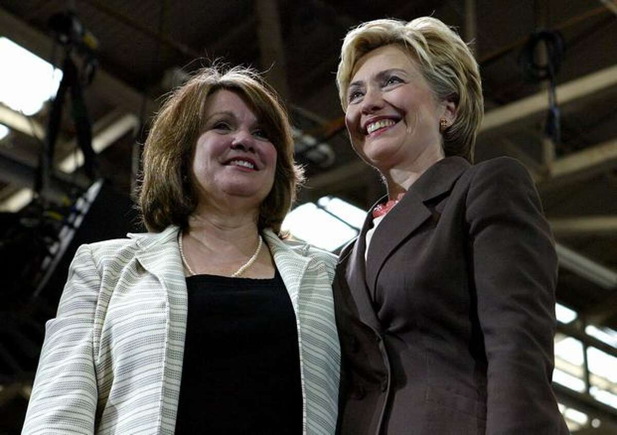 Elizabeth Edwards (L) stands with former First Lady Senator Hillary Rodham Clinton (D-NY) during a Kerry/Edwards Victory 2004 breakfast reception July 9, 2004 in New York City.