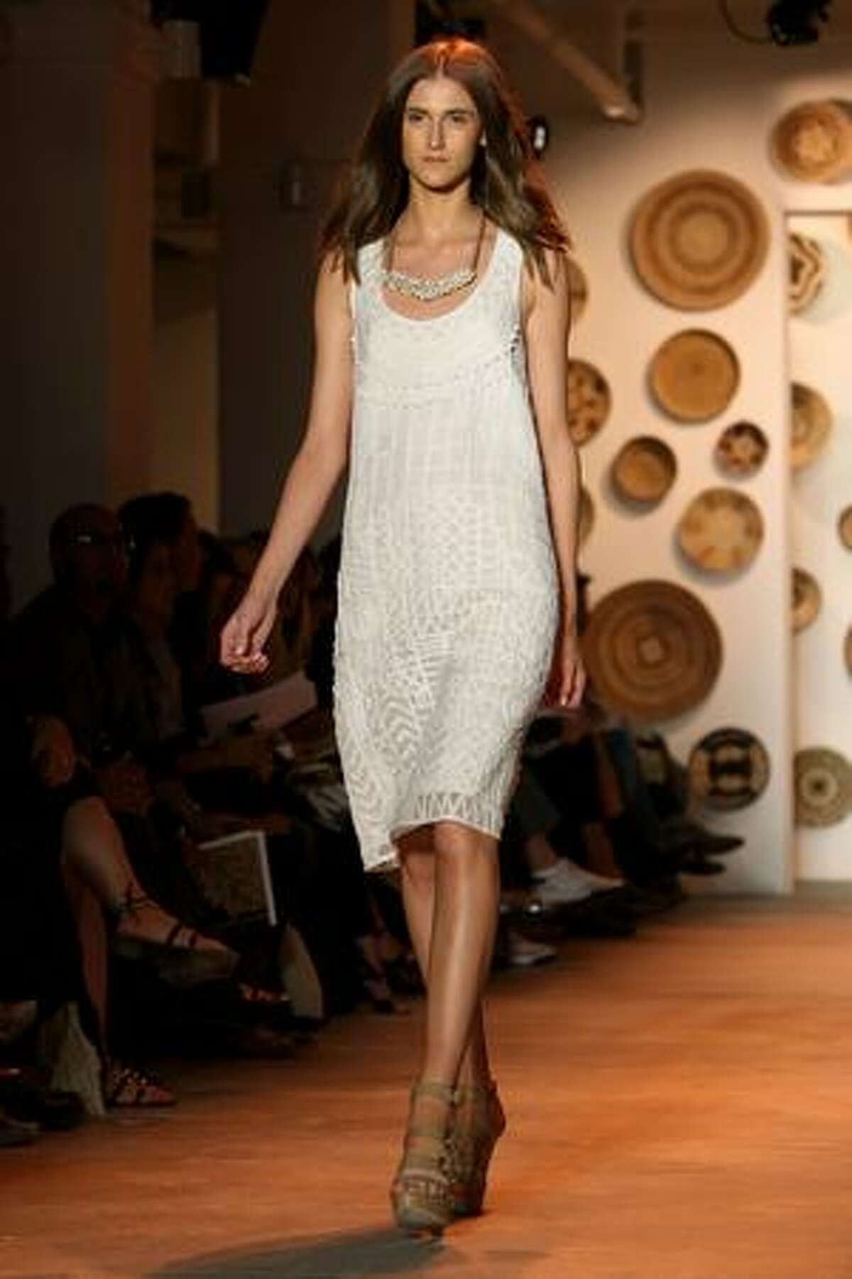 A model walks the runway at the Adam Spring 2010 Fashion Show during Mercedes-Benz Fashion Week at Milk Studios on September 12 in New York, New York.