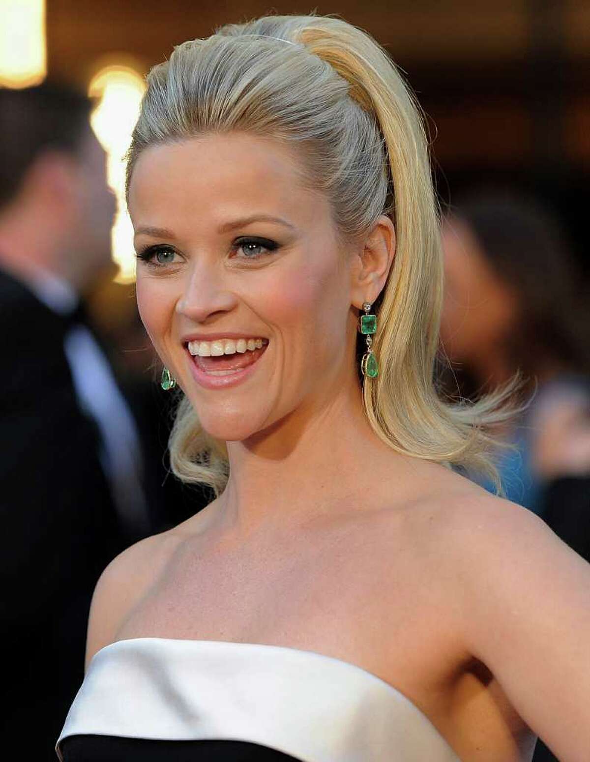 FILE - In this Feb. 27, 2011 file photo, Reese Witherspoon arrives before the 83rd Academy Awards in the Hollywood section of Los Angeles. A spokeswoman for Witherspoon says the star wed her fiance, Hollywood agent Jim Toth, Saturday, March 26, 2011 in Ojai, Calif., about 90 miles north of Los Angeles. (AP Photo/Chris Pizzello, File)