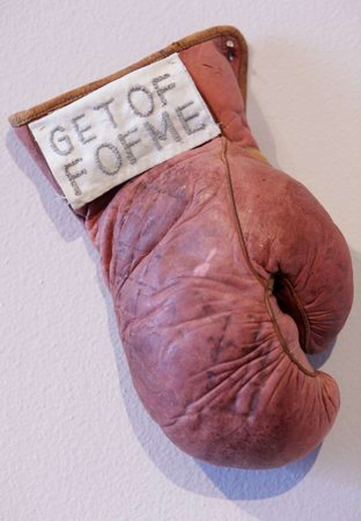 "Untitled (Get Off Me)" by Kat Larson is shown at pun(c)tuation art gallery on East Pike Street in Seattle on Tuesday May 11, 2010. Art at the show deals with the issue of Alley-Barnes and his beating by Seattle Police officers in 2005.