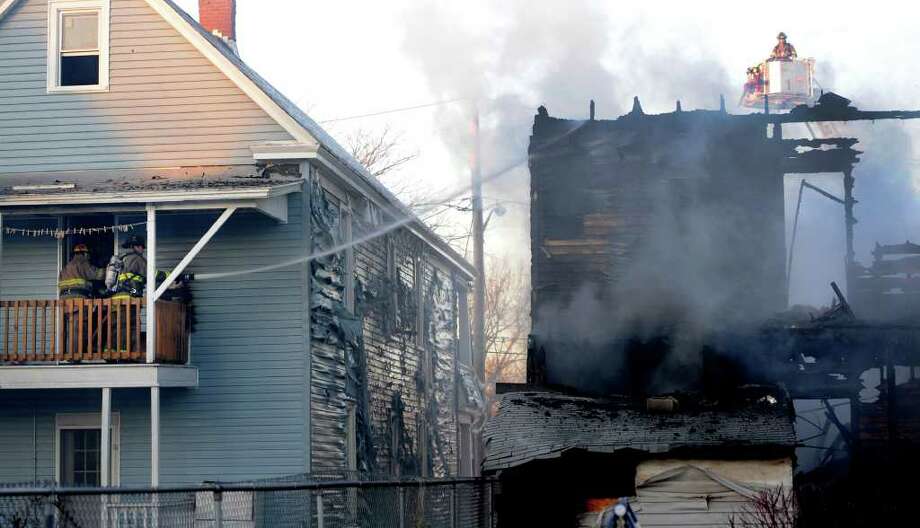 In two cities, house fires claim two women Times Union