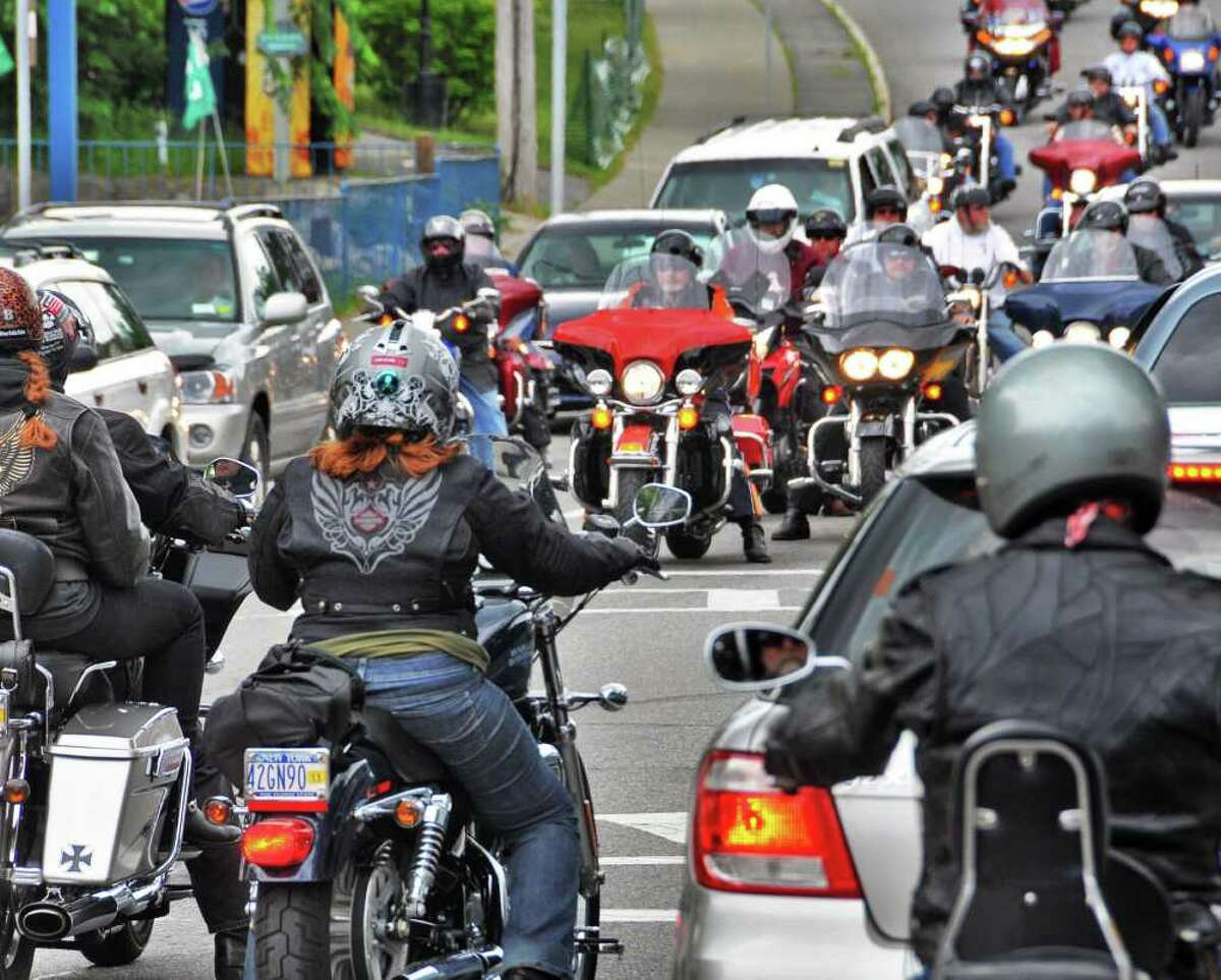 Bikers along Canada Street in Lake George Village on June 8 for the annual Americade. (John Carl D'Annibale / Times Union)