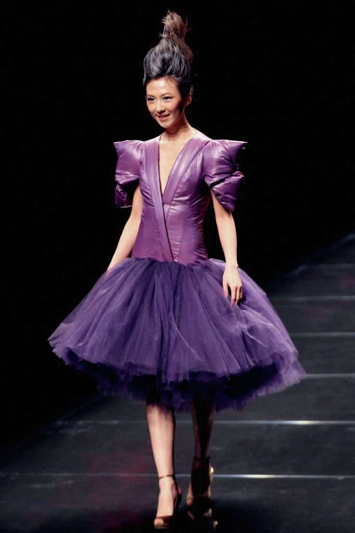 A model walks the runway at the Bosideng Fall/Winter 2011/2012 fashion show during on the Fifth day of China Fashion Week A/W 2011 on March 28, 2011 in Beijing, China.