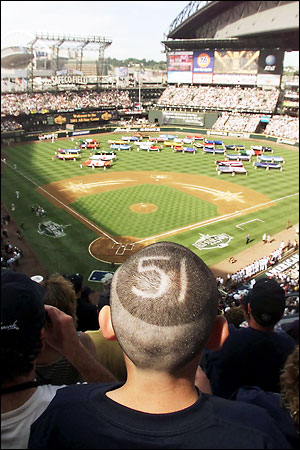 AngelShohei signs for a Mariners' fan at Safeco Field [05-05-18