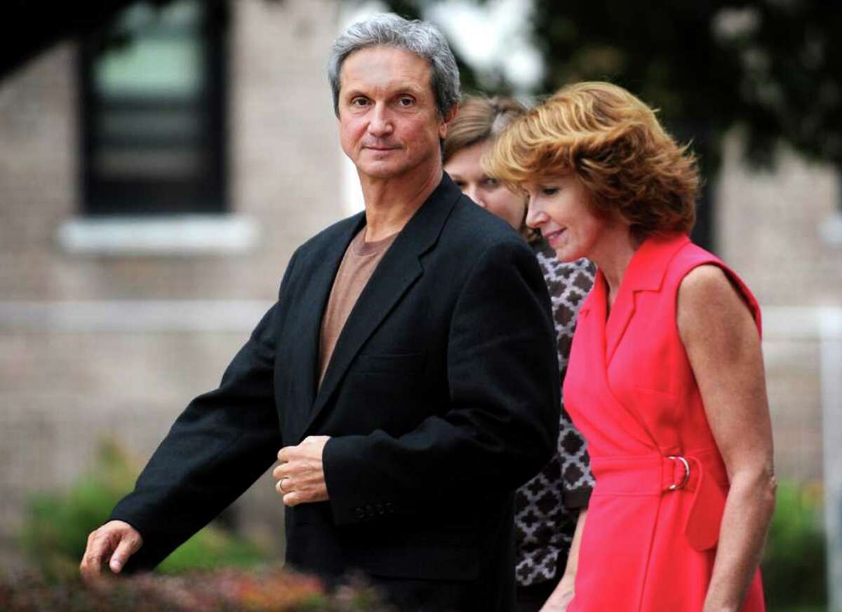 Former Danbury Hospital CFO William Roe leaves federal district court in Bridgeport with his wife Diane after being released on bail Thursday September 9, 2010.