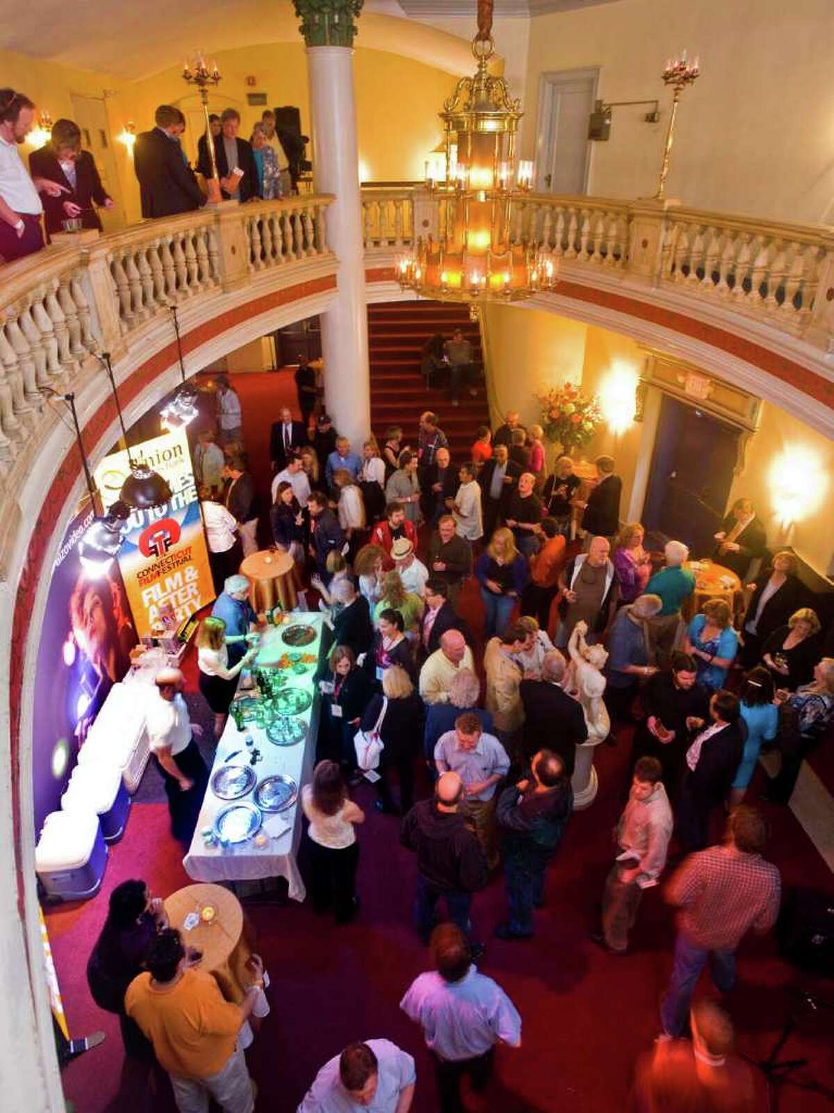 Folks gather in the lobby of the Palace Theater in Danbury prior to the start of the Connecticut Film Festival's showing of the documentary "The Wrecking Crew." Tuesday, May 4, 2010