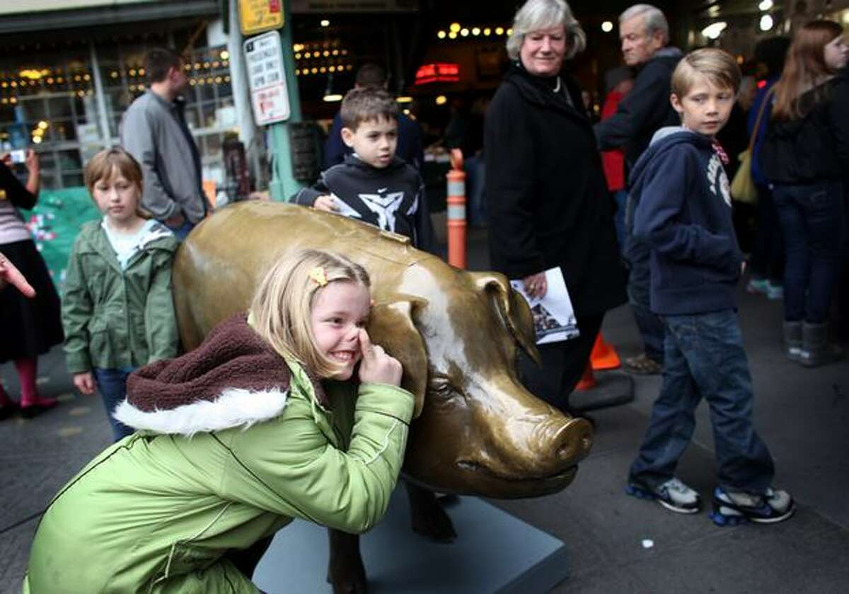 The bronze cast piggy bank more commonly known as Rachel, an icon at Pike Place Market, was based as an outdoor bronze sculpture in 1986 as the Market's foundation piggy bank. Annually, Rachel takes in around $9,000 in currency from across the globe, all of which funds the market's social services.