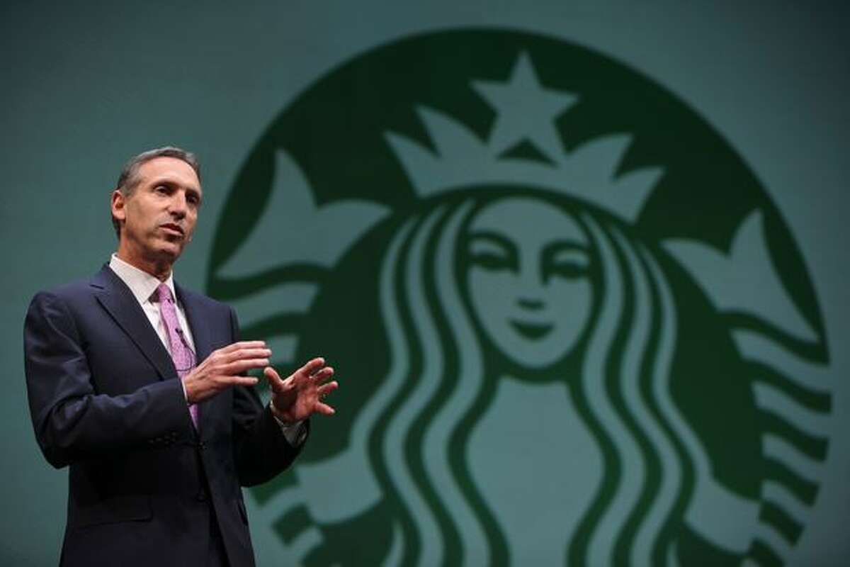 Howard Schultz, chairman, president and chief executive of Starbucks, speaks to shareholders during the annual Starbucks shareholders meeting on Wednesday.