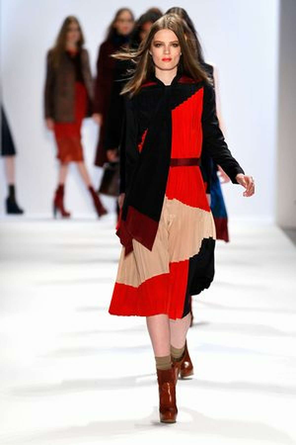 A model walks the runway at the Jill Stuart show.