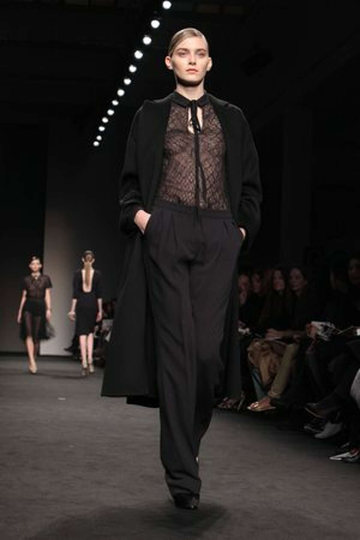 A model walks the runway during the Brioni fashion show.