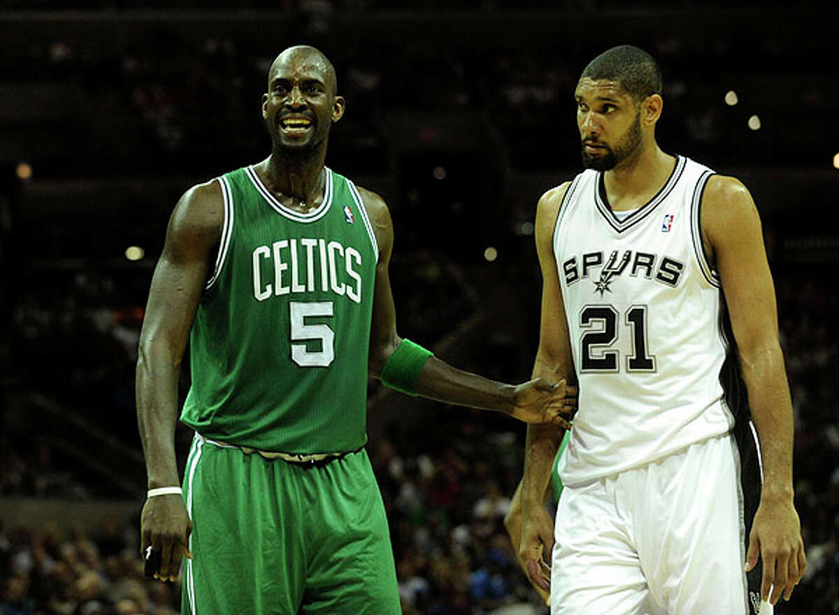 Celtics forward Kevin Garnett (left) reacts to a call as Tim Duncan of the Spurs watches at the AT&T Center on Thursday. BILLY CALZADA / gcalzada@express-news.net