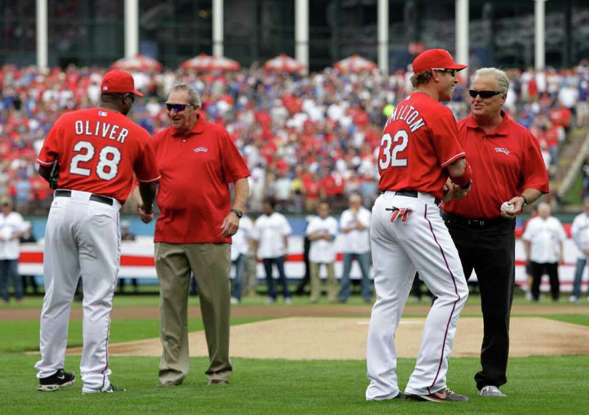 Former baseball player Adrian Beltre, left, greets former teammate