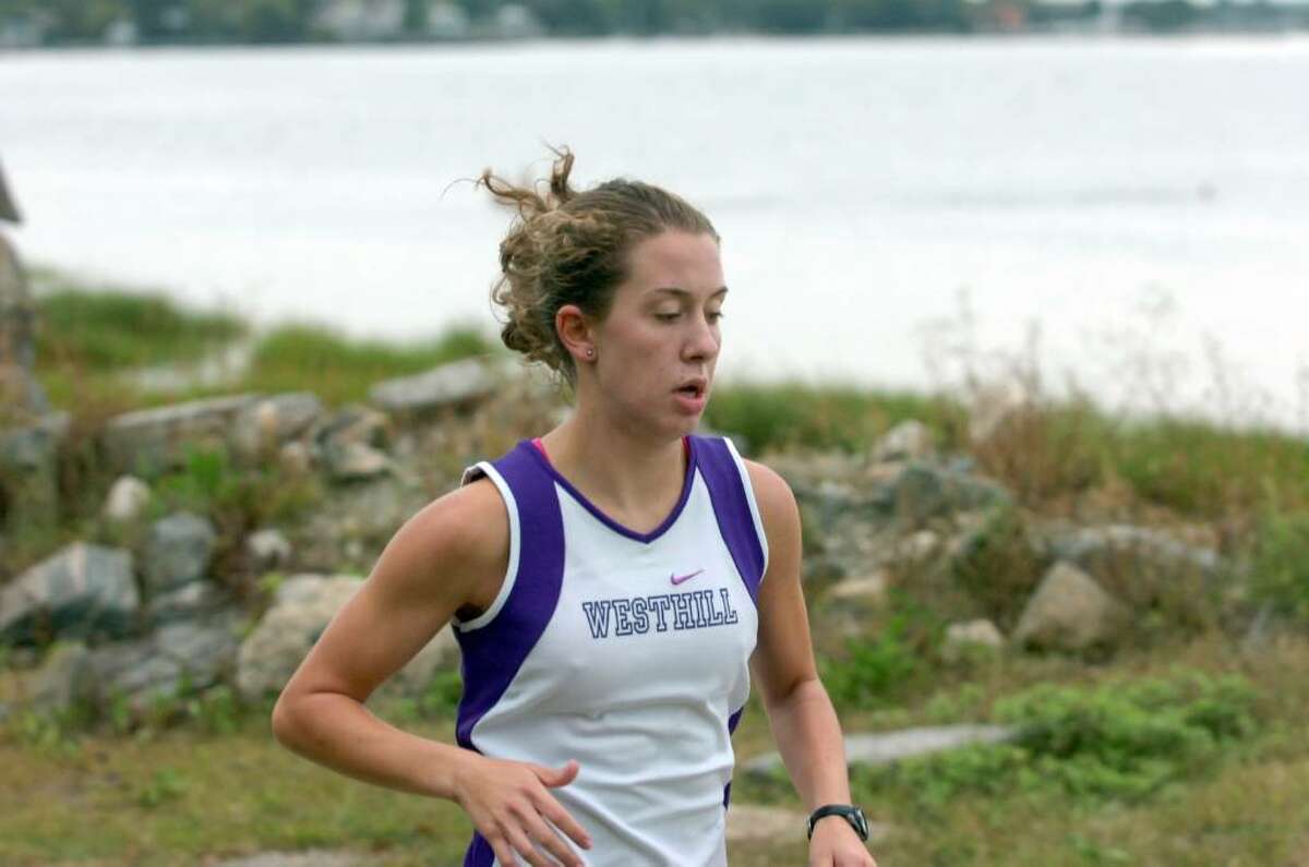 Westhill Cross Country team's Maddie Elkins breezes around Tod's Point during the Greenwich High School Cross Country Meet Tuesday afternoon, Sept. 22, 2009.