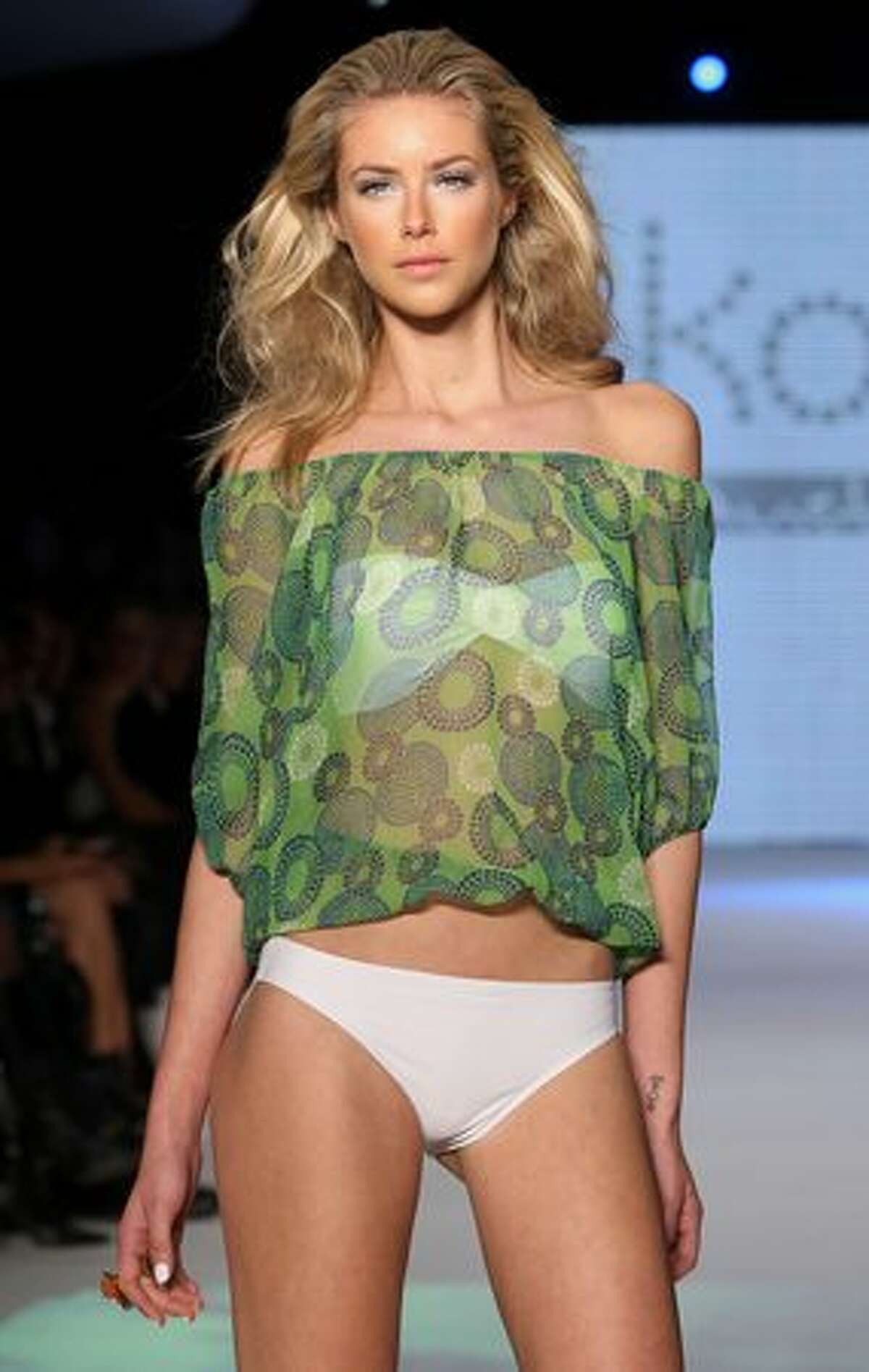 A model showcases designs on the catwalk during the Kooey collection show on the fourth day of Rosemount Australian Fashion Week Spring/Summer 2010/11 in Sydney, Australia.