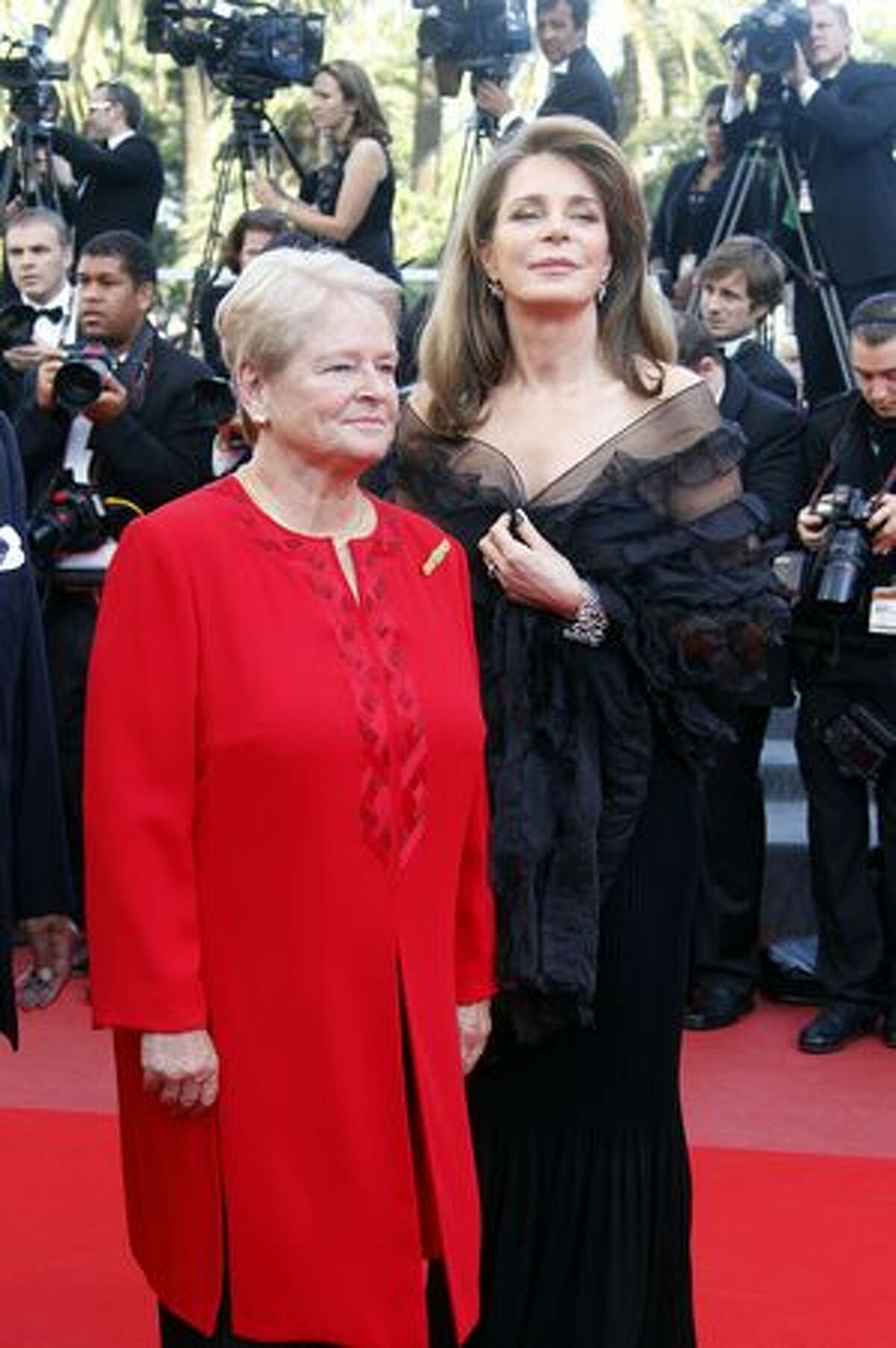 Queen Noor of Jordan (R) and former Norway's Prime Minister Dr Gro Bruntland (C) arrive for the screening of "Biutiful" presented in competition at the 63rd Cannes Film Festival in Cannes.