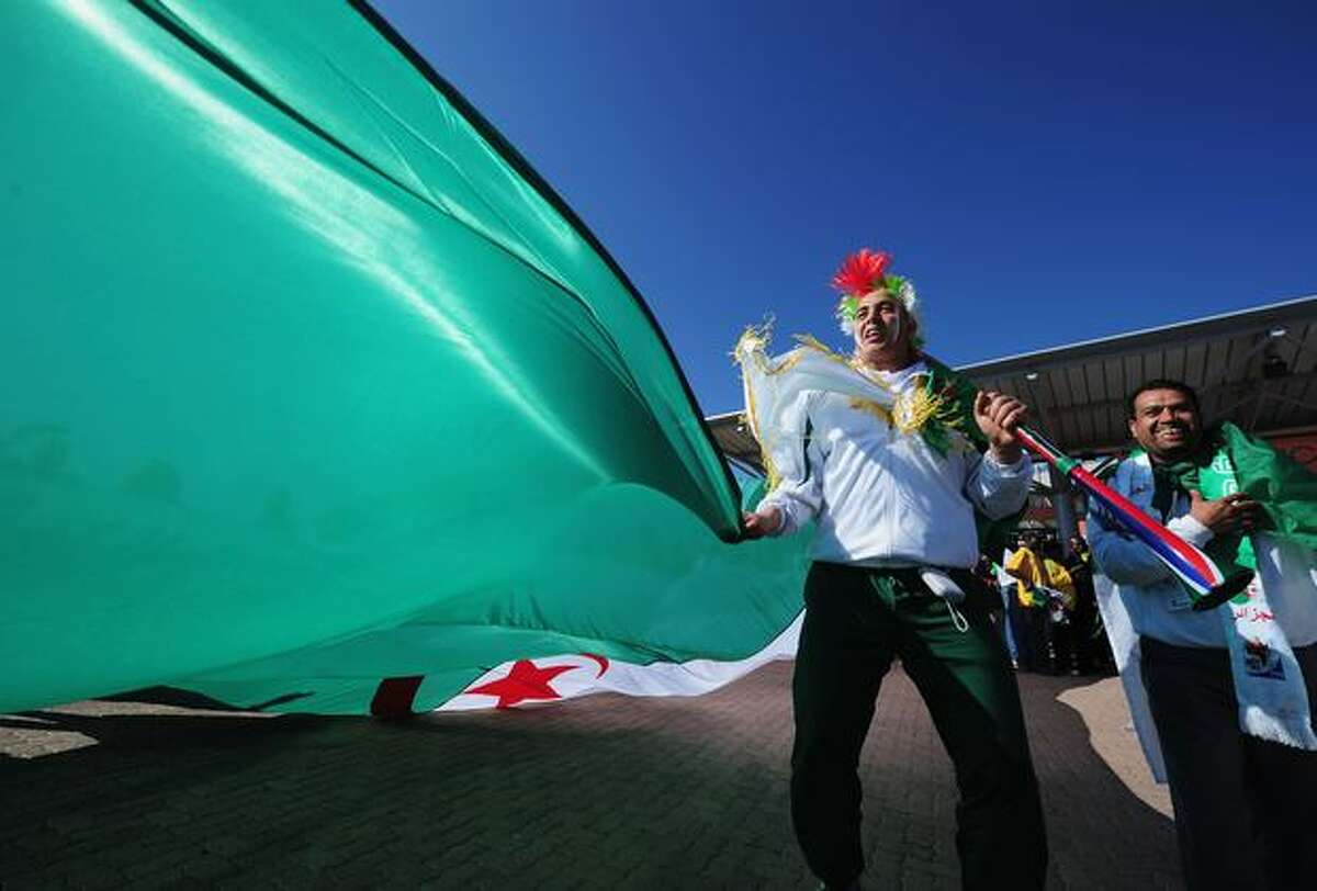 Algerian fans enjoy the atmosphere ahead of the 2010 FIFA World Cup South Africa Group C match between Algeria and Slovenia at the Peter Mokaba Stadium in Polokwane, South Africa on Sunday, June 13, 2010.