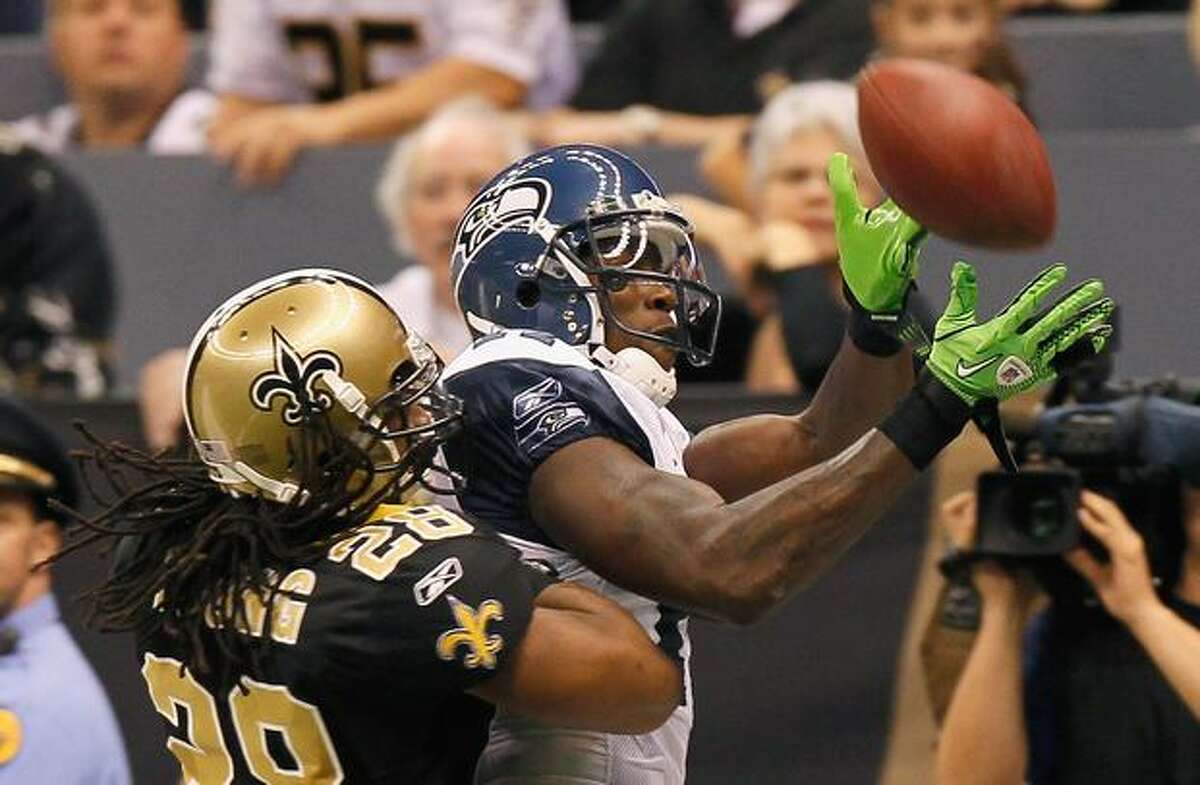 Mike Williams (17) of the Seattle Seahawks fails to pull in this touchdown reception against Usama Young (28) of the New Orleans Saints at Louisiana Superdome in New Orleans.
