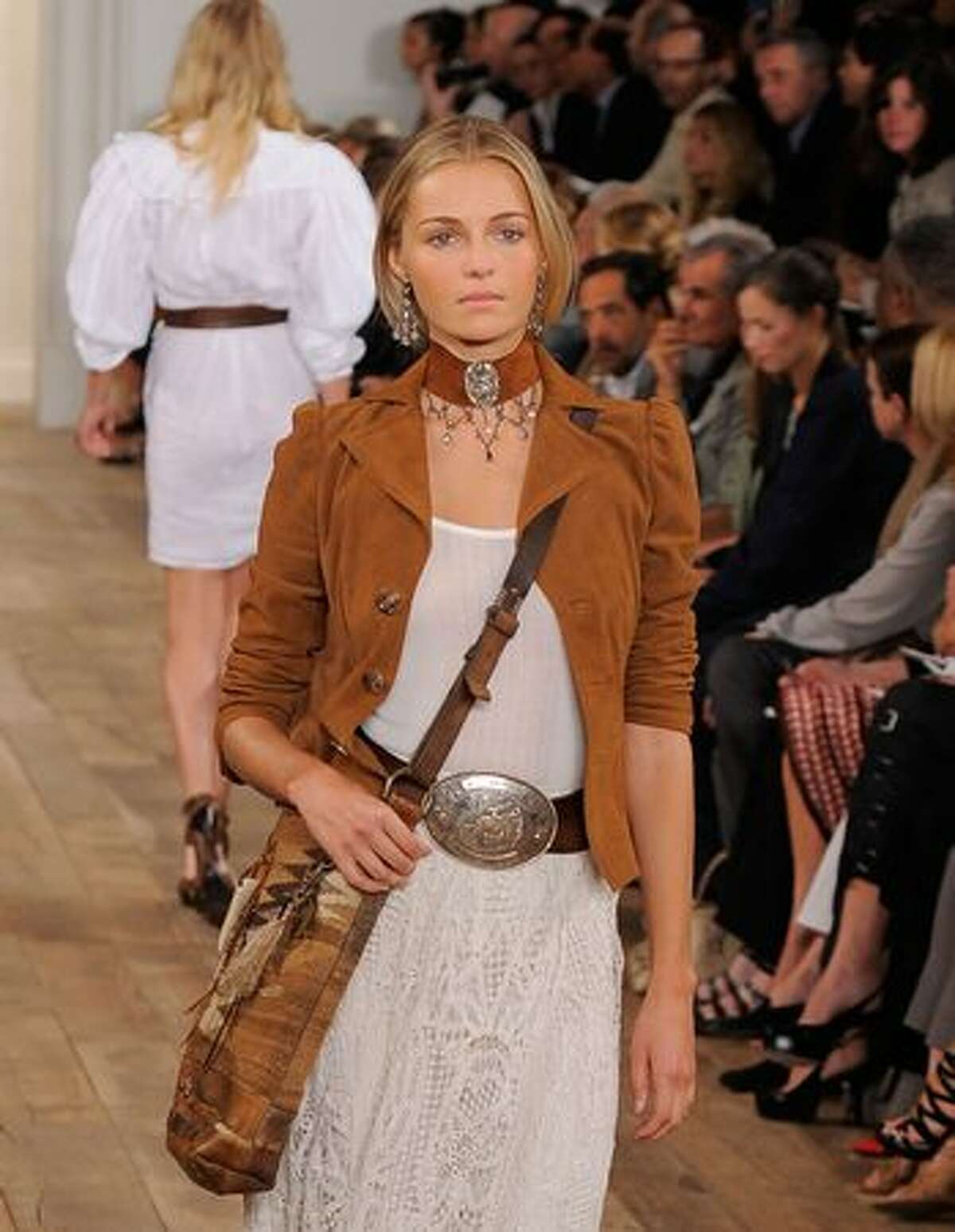 A model walks the runway at the Ralph Lauren Spring 2011 fashion show during Mercedes-Benz Fashion Week in New York City.