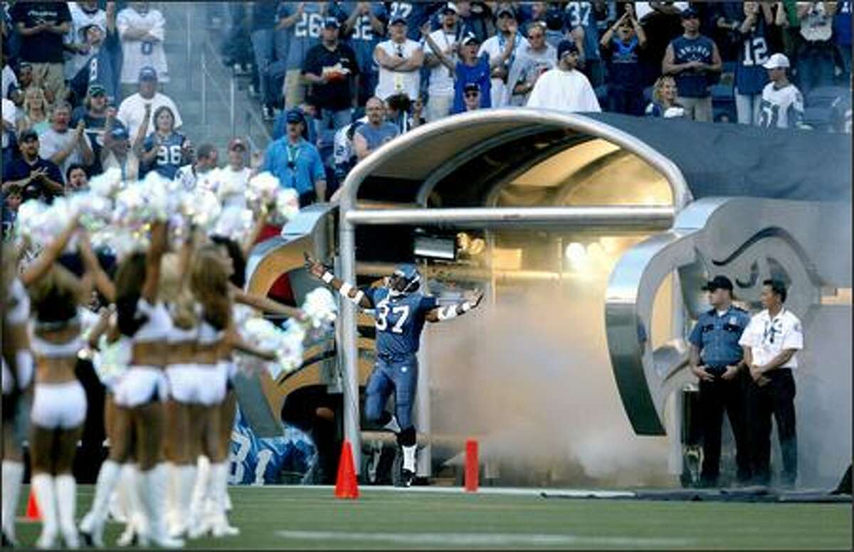 Shaun Alexander dances onto the field as he is introduced prior to the start of the game.