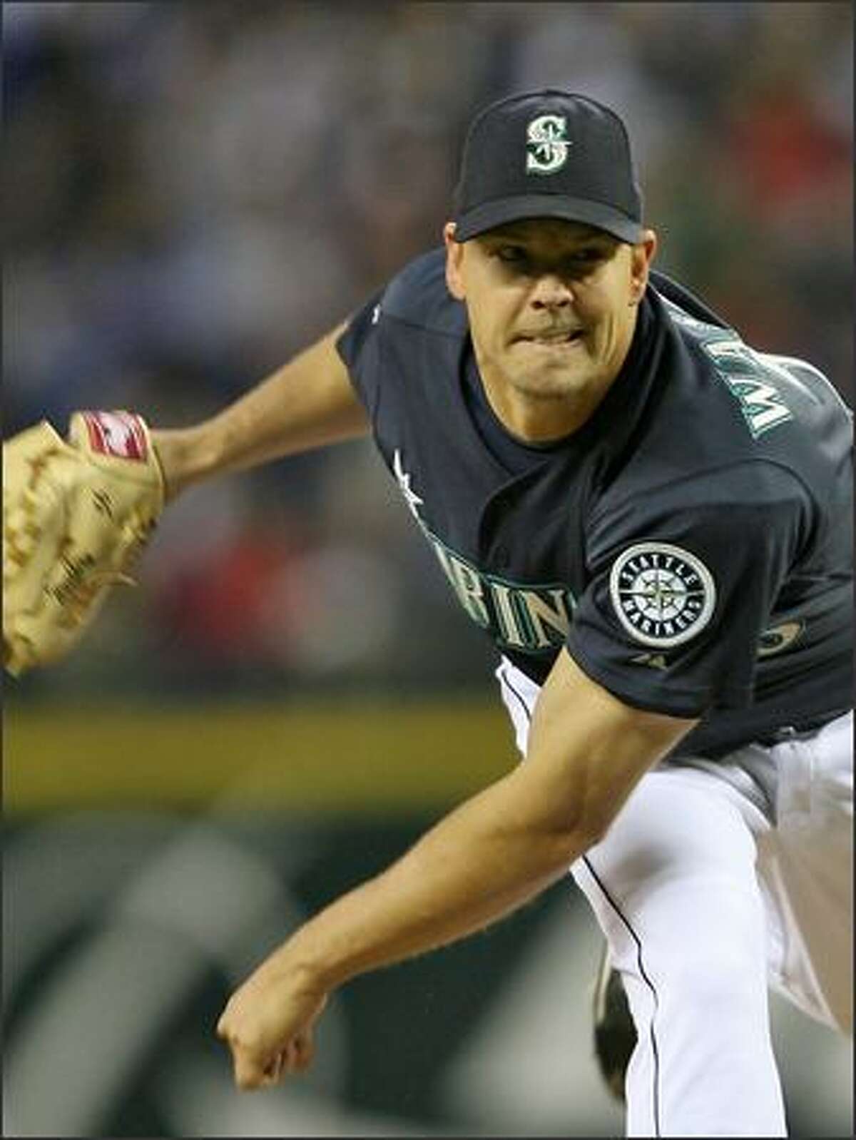 Mariners starter Jarrod Washburn pitches against the New York Yankees during the seventh inning. He held the Yankees scoreless for eight innings to win 3-0.