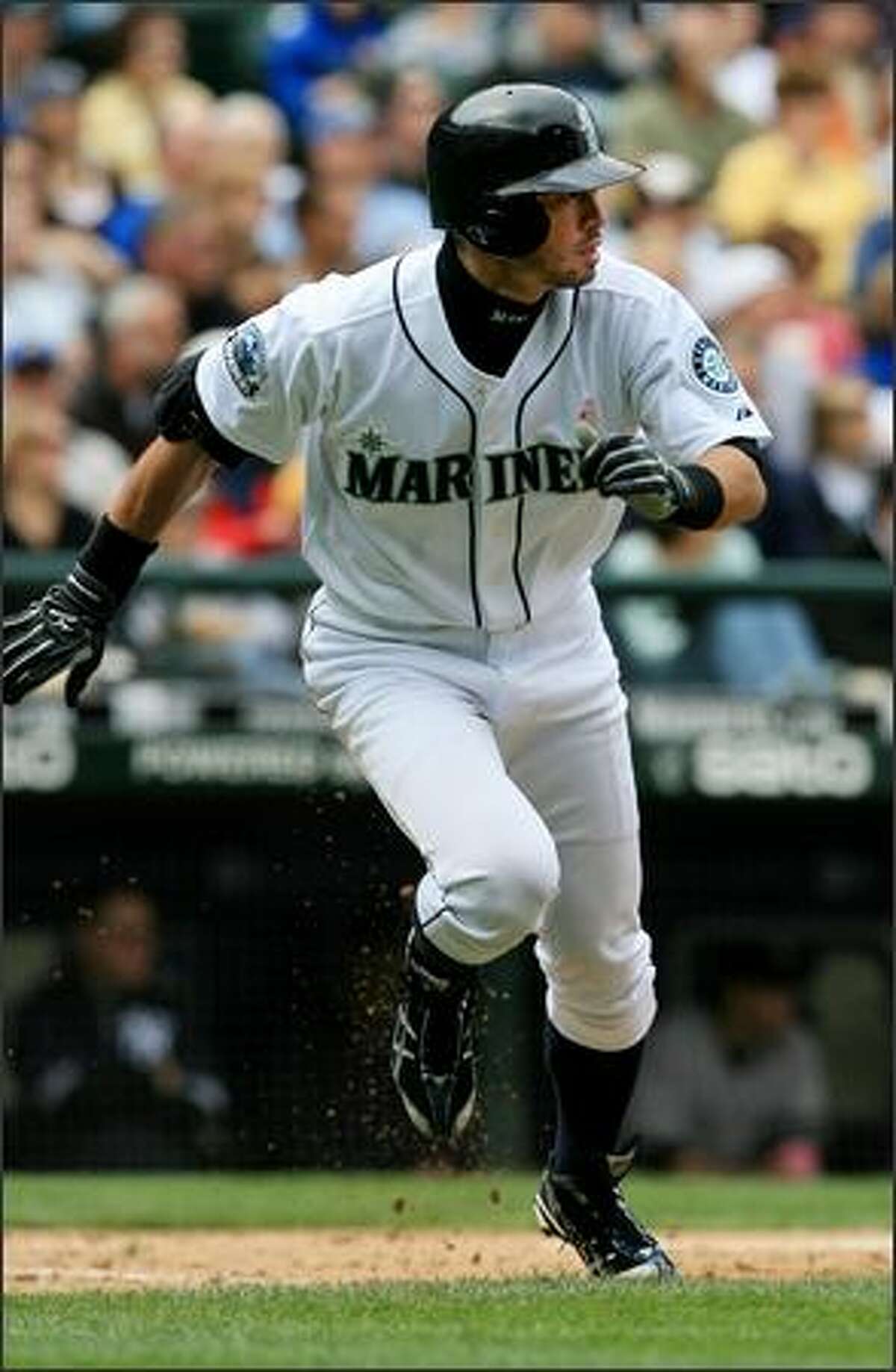 Seattle Mariners' Ichiro Suzuki hustles out a single, his first of two on the day, against New York Yankees' Andy Pettitte, during the 3rd inning. Ichiro later scored on a hit by Raul Ibanez.