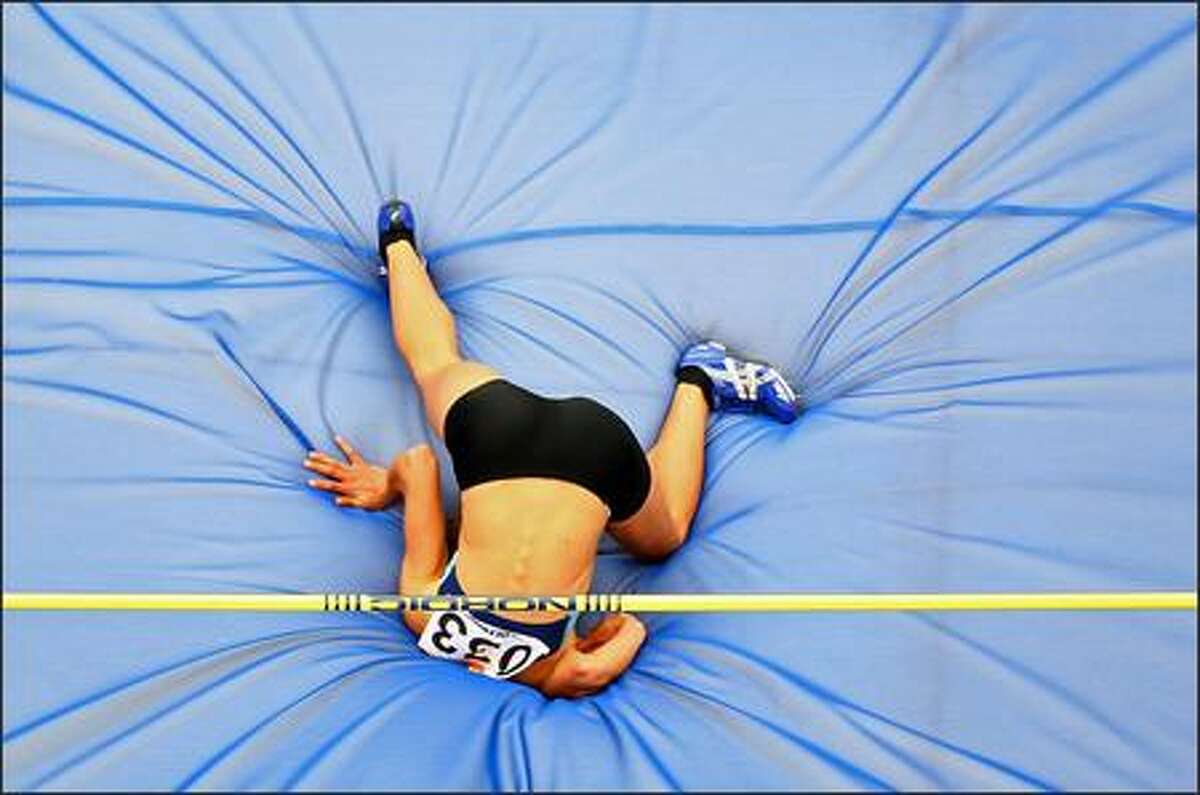 Daniela Crespo of Argentina lands after her attempt in the High Jump portion of the Heptathlon event during the 2007 XV Pan American Games at the Joao Havelange Stadium on July 24, 2007 in Rio de Janeiro, Brazil. Photo by Donald Miralle/Getty Images