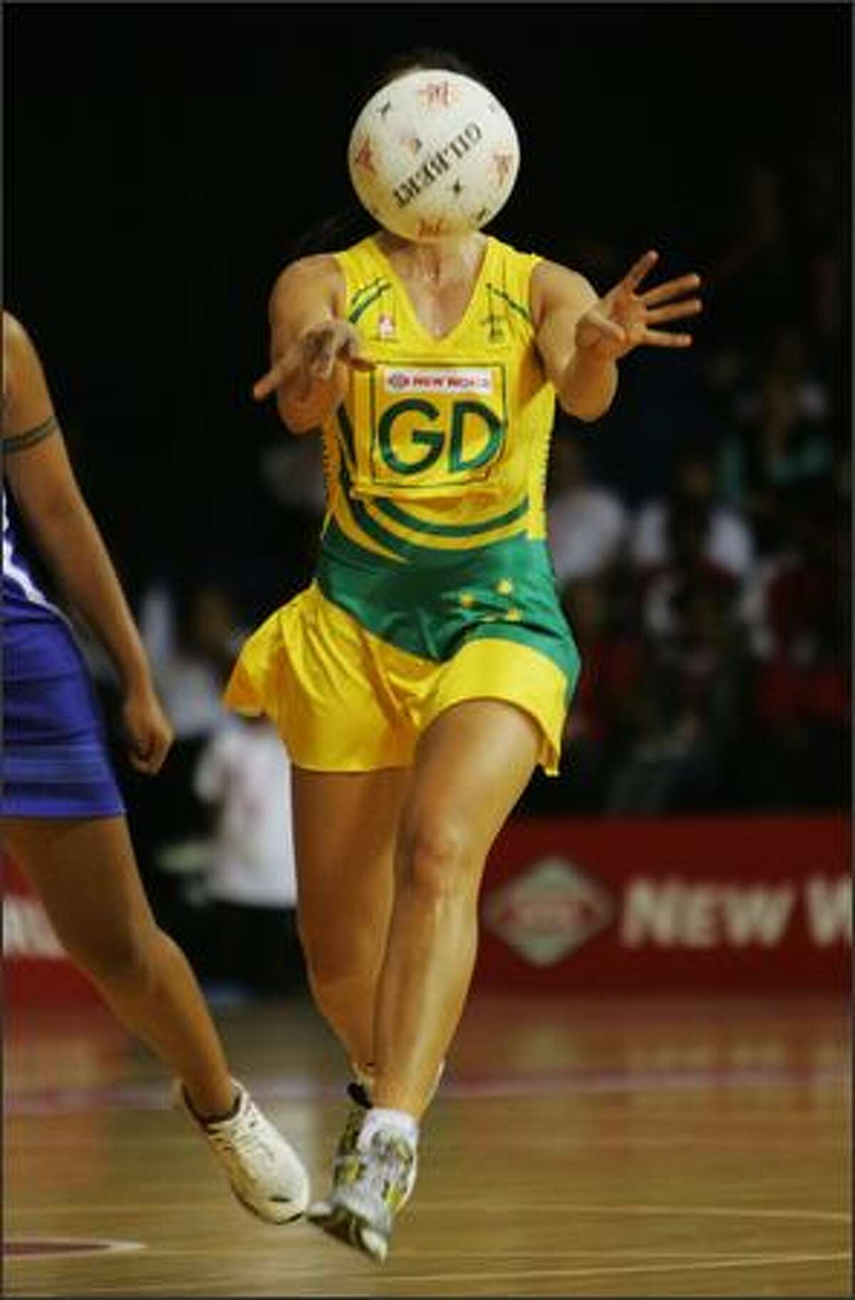 Mo'onia Gerrard of Australia passes the ball during the 2007 Netball World Championship pool B match between Australia and Samoa at the Trusts Stadium in Auckland, New Zealand. (Photo by Sandra Mu/Getty Images)