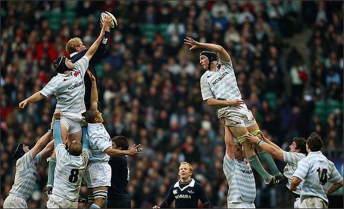 Ian Kench of Oxford jumps in the line out with Martin Wilson and Daniel Vickerman of Cambridge during the Varsity Rugby Match between Oxford University and Cambridge University at Twickenham in Twickenham, England. (Photo by Jamie McDonald/Getty Images)
