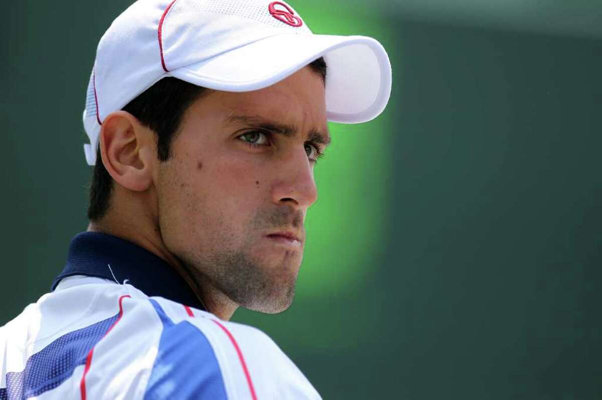 KEY BISCAYNE, FL - APRIL 01: Novak Djokovic of Serbia looks on against Mardy Fish during their semifinal match at the Sony Ericsson Open at Crandon Park Tennis Center on April 1, 2011 in Key Biscayne, Florida. (Photo by Al Bello/Getty Images)