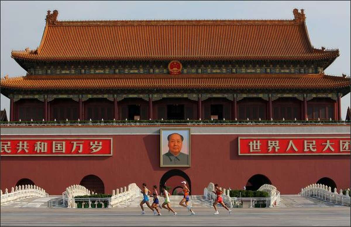 A general view of runners passing through Tianamen Square during the Men's Marathon held at the National Stadium during Day 16 of the Beijing 2008 Olympic Games on Sunday in Beijing.