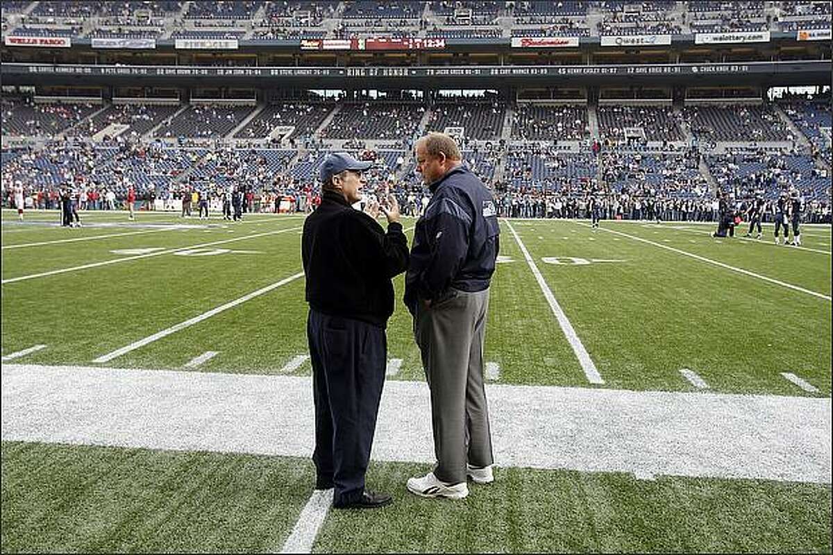 Seahawks owner Paul Allen visits with Seahawks head coach Mike Holmgren prior to their game against the Arizona Cardinals at Qwest Field.
