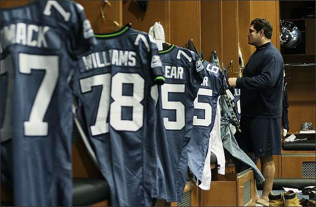 Seahawks offensive lineman Steve Vallos, who started at center for the last five games, cleans out his locker at the Virginia Mason Athletic Center.