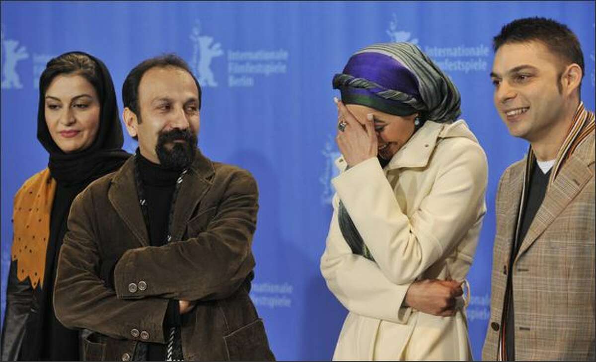 From left, Iranian actress Merila Zareibarzi, Iranian director Ashgar Farhadi, actress Rana Azadivar, and actor Peyman Moadi pose during a photocall for the film "About Elly."