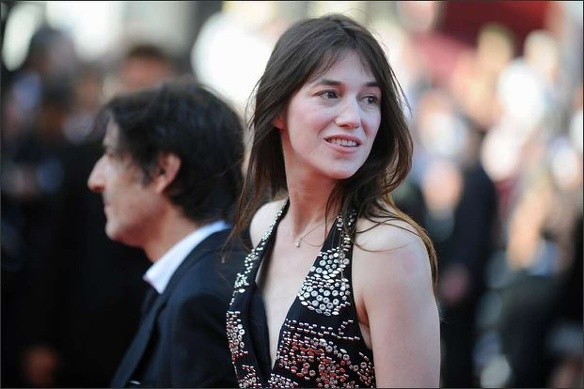 French actress Charlotte Gainsbourg and her husband, Yvan Attal, arrive for the screening of the movie "Coco Chanel & Igor Stravinsky" by French director Jan Kounen at the Closing Ceremony of the 62nd Cannes Film Festival on Sunday in Cannes, France.